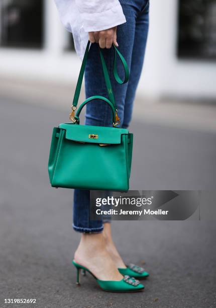 Alexandra Lapp wearing white Pancaldi & B for Tandem linen blouse, blue Citizens of Humanity jeans, green Hermès Kelly leather bag and green Manolo...