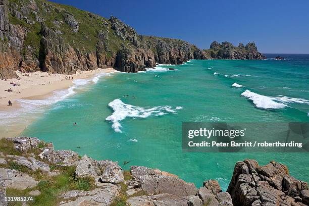 surf and turquoise sea at pednvounder beach in summer sunshine, treen cliff, near porthcurno, lands end peninsula, west penwith, cornwall, england, united kingdom, europe - penwith peninsula stock pictures, royalty-free photos & images