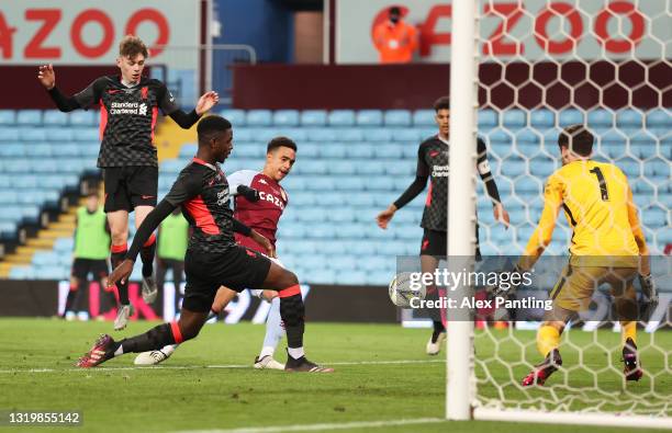 Harvey Davies of Liverpool makes a save from the shot of Aaron Ramsey of Aston Villa during the FA Youth Cup Final match between Aston Villa U18 and...
