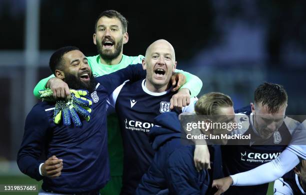 Dundee midfield lynchpin Charlie Adam celebrates with team mates after the Scottish Premiership Playoff Final 2nd Leg between Kilmarnock and Dundee...