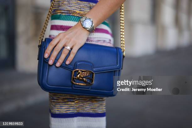 Cleo zu Oettingen-Spielberg wearing colorful striped Missoni dress and blue Etro leather bag via Lodenfrey SS21 on May 10, 2021 in Munich, Germany.