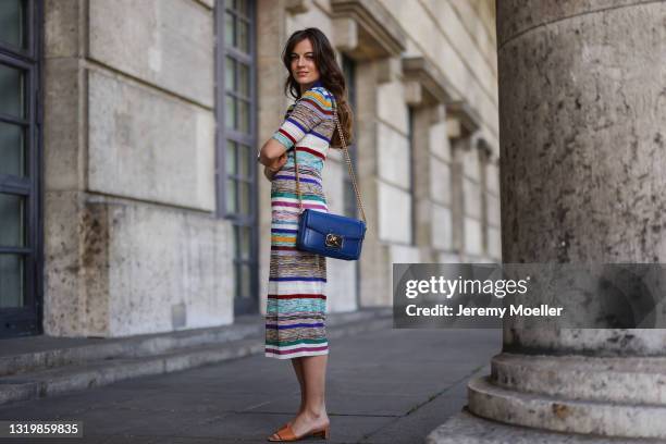 Cleo zu Oettingen-Spielberg wearing colorful striped Missoni dress and blue Etro leather bag via Lodenfrey SS21 on May 10, 2021 in Munich, Germany.