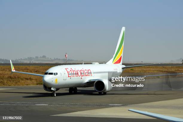 ethiopian airlines boeing 737 max - addis ababa bole international airport, ethiopia - ethiopian airlines stock pictures, royalty-free photos & images