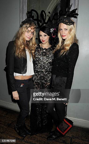 Cara Delevingne, Stacey Bendet and Poppy Delevingne attend the Alice + Olivia Black Tie Carnival hosted by designer Stacey Bendet at Paradise by Way...