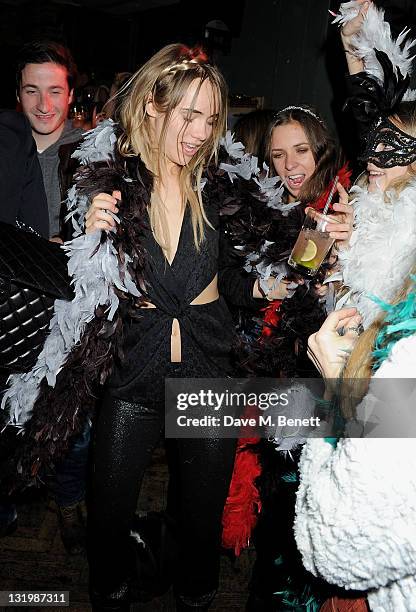 Blaise Patrick, Suki Waterhouse, Alice Brinkley and Cara Delevingne attend the Alice + Olivia Black Tie Carnival hosted by designer Stacey Bendet at...