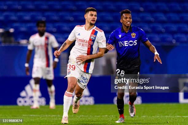 Bruno Guimaraes of Olympique Lyon runs in the field during the Ligue 1 match between Olympique Lyon and OGC Nice at Groupama Stadium on May 23, 2021...