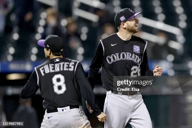 Austin Gomber of the Colorado Rockies celebrates the win with teammate Josh Fuentes after the game against the New York Mets at Citi Field on May 24,...