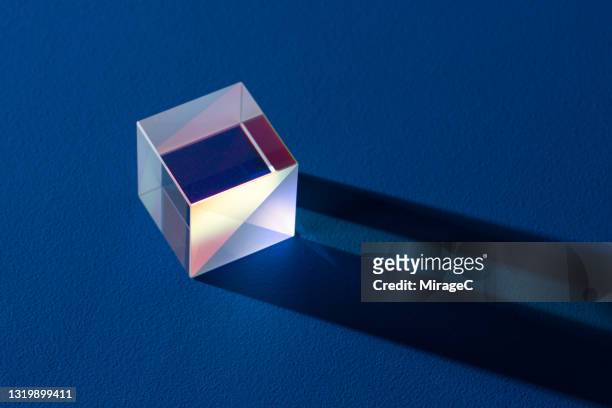 cube prism light and shadow on azure blue - プリズム　レンズ ストックフォトと画像