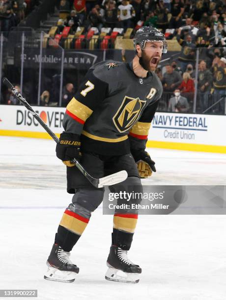 Alex Pietrangelo of the Vegas Golden Knights reacts after assisting Alec Martinez on a second-period power-play goal against the Minnesota Wild in...