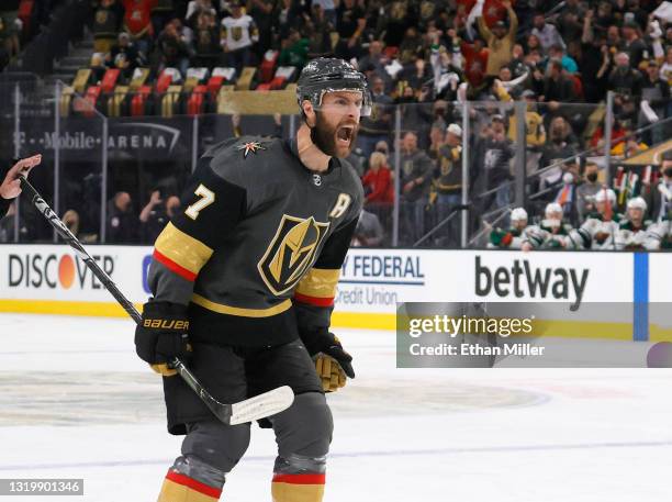 Alex Pietrangelo of the Vegas Golden Knights reacts after assisting Alec Martinez on a second-period power-play goal against the Minnesota Wild in...