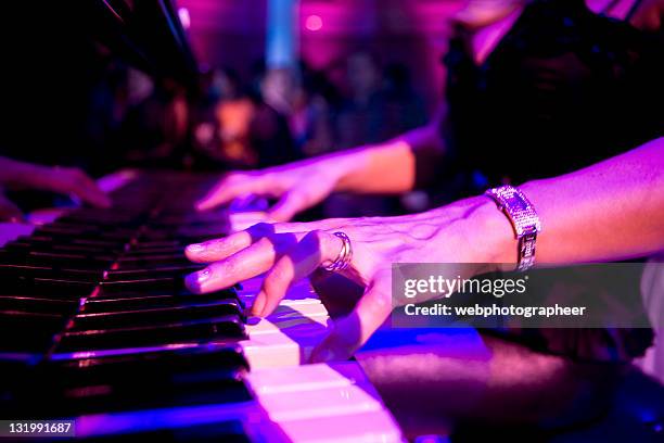 playing piano - keyboard instrument stock pictures, royalty-free photos & images