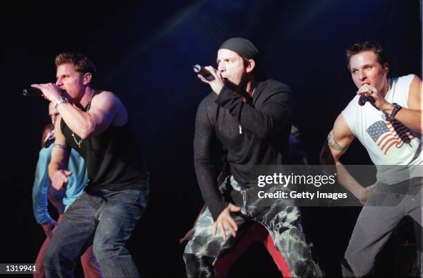 From left to right, Justin Lache, Nick Lachey, Jeff Timmons and Drew Lachey of the boy band 98 Degrees perform at KIIS-FM''s Holiday Jingle Balls...