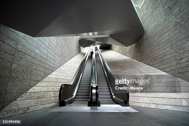 wide angle modern architecture escalator - rock bottom stock pictures, royalty-free photos & images