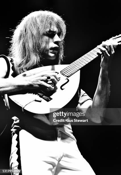 Steve Howe of Yes performs on stage at Wembley Empire Pool during their 'Going for the One' tour in London, England, on October 24th, 1977.