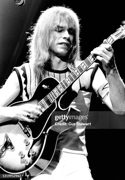 Steve Howe of Yes performs on stage at Wembley Empire Pool during their 'Going for the One' tour in London, England, on October 24th, 1977.