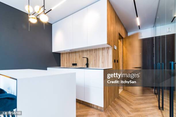 modern apartment, view to new, clean kitchen - close door stock pictures, royalty-free photos & images