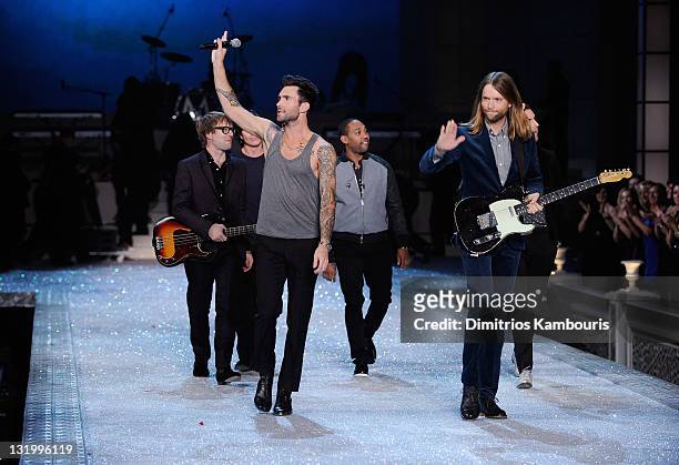 Mickey Madden , Adam Levine , and James Valentine perform during the 2011 Victoria's Secret Fashion Show at the Lexington Avenue Armory on November...