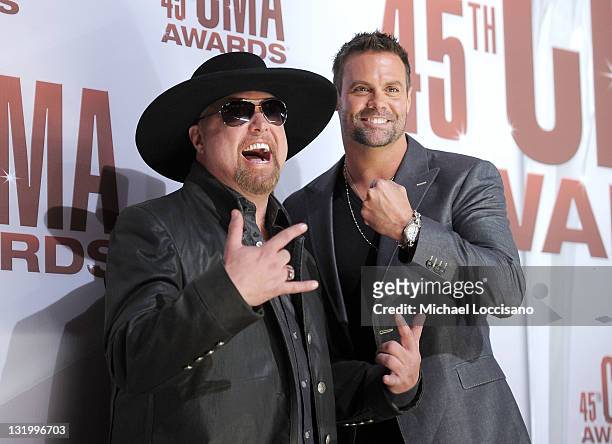 Eddie Montgomery and Troy Gentry of Montgomery Gentry attends the 45th annual CMA Awards at the Bridgestone Arena on November 9, 2011 in Nashville,...