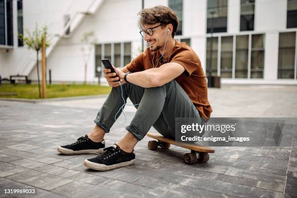 i enjoy doing things i love - person skateboarding stock pictures, royalty-free photos & images