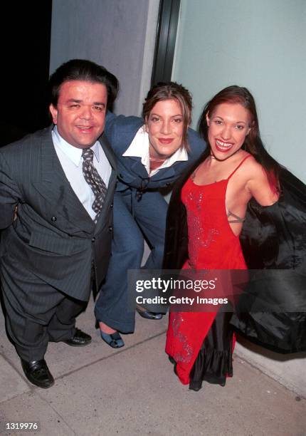 Actress Tori Spelling, center, poses with actors Gary Friedkin and Bridgette Powers during a party and final shoot for "Joe Head Goes Hollywood"...