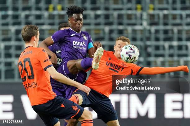 Albert Sambi Lokonga of RSC Anderlecht is challenged by Hans Vanaken of Club Brugge KV and Noa Lang of Club Brugge KV during the Jupiler Pro League...