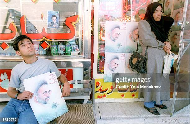 Abbas Aghapoor takes a break outside the Shashlik restaurant June 7, 2001 in central Tehran, Iran on the eve of the Iranian presidential election,...