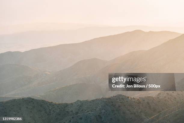 scenic view of mountains against sky - yucca valley stock pictures, royalty-free photos & images