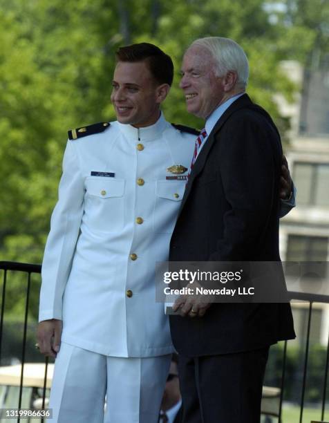 Midshipman Tyler Stutin, president of class of 2007, presented the class gift, an I-pod, to Sen. John McCain at the U.S. Merchant Marine Academy in...