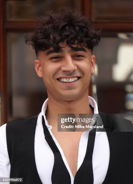 Karim Zeroual poses during the "Here Come The Boys" photocall at London Palladium on May 25, 2021 in London, England.