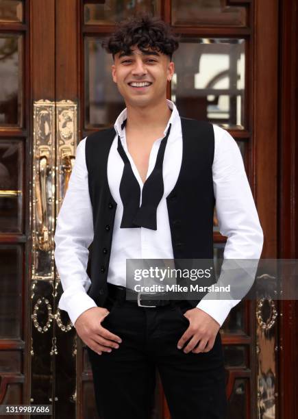 Karim Zeroual poses during the "Here Come The Boys" photocall at London Palladium on May 25, 2021 in London, England.