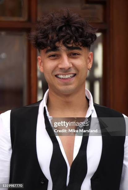 Karim Zeroual poses during the "Here Come The Boys" photocall at London Palladium on May 25, 2021 in London, England.