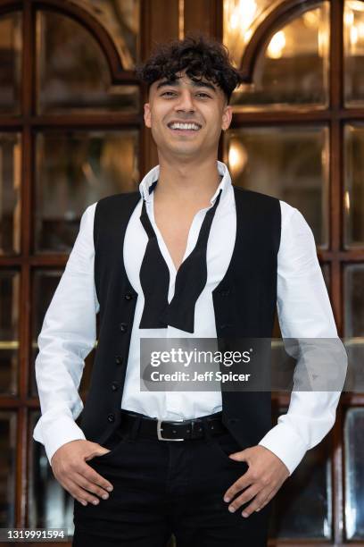 Karim Zeroual poses during the "Here Come The Boys" photocall at London Palladium on May 25, 2021 in London, England.