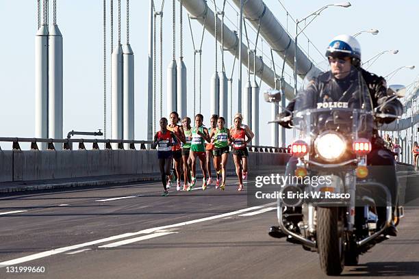 New York City Marathon: Ethiopia Firehiwot Dado and others in action crossing Verrazano Narrows Bridge. Dado wins women's marathon with a time of 2...