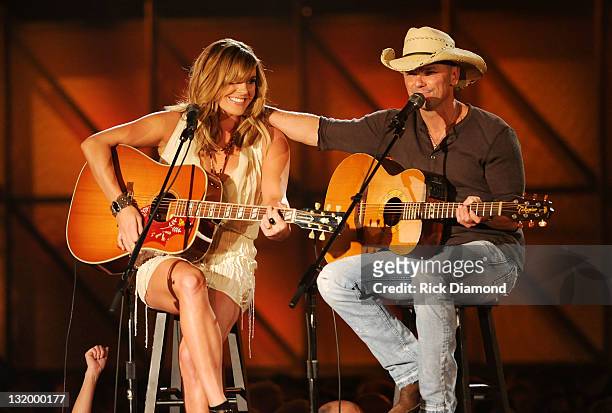Grace Potter and Kenny Chesney perform at the 45th annual CMA Awards at the Bridgestone Arena on November 9, 2011 in Nashville, Tennessee.