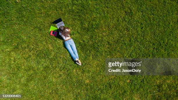 young adult college student - garden from above stock pictures, royalty-free photos & images