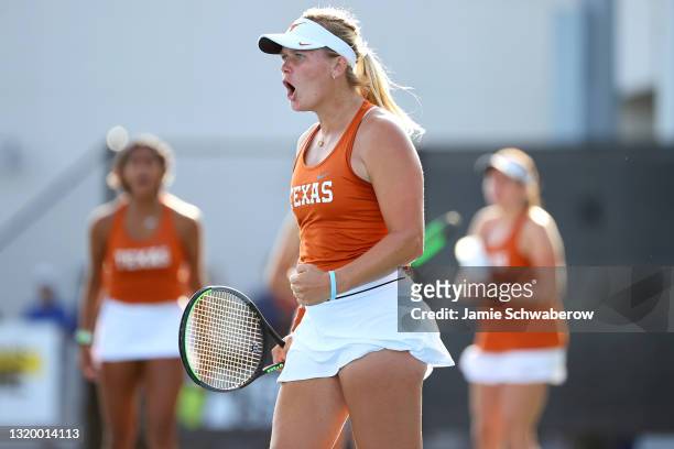 Peyton Stearns of the Texas Longhorns celebrates a point against the Pepperdine Waves during the Division I Women"u2019s Tennis Championship held at...