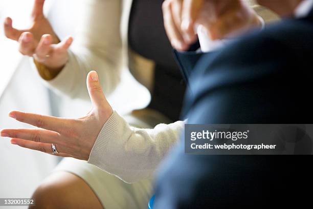 businesswoman gesturing - business meeting blurry stock pictures, royalty-free photos & images