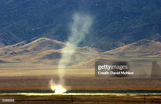 Dust devil forms as the temperature hovers around 106 degrees in the Carrizo Plain National Monument, June 1, 2001. Two months ago, temperatures were...
