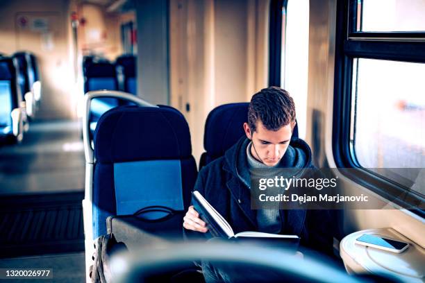 train ride - man riding bus stock pictures, royalty-free photos & images