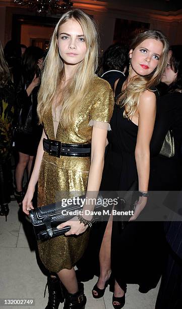 Cara Delevingne and Katie Readman attend the Harper's Bazaar Women Of The Year Awards in association with Estee Lauder and NET-A-PORTER at Claridges...