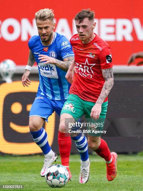 Niklas Dorsch of KAA Gent battles for posession with Indy Boonen of KV Oostende during the jupiler pro league match between KAA Gent and KV Oostende...