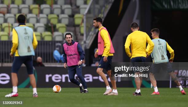 Unai Emery, Head Coach of Villarreal CF looks on during the Villarreal CF Training Session ahead of the UEFA Europa League Final between Villarreal...