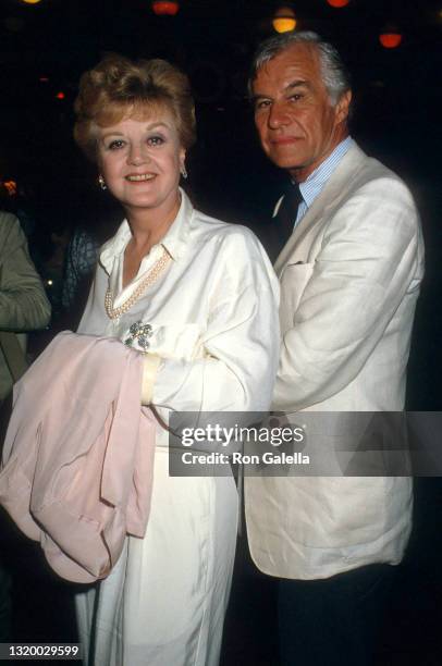 Angela Lansbury and Peter Shaw attend "The Untouchables" Premiere at Loew's Astor Plaza Theater in New York City on June 2, 1987.