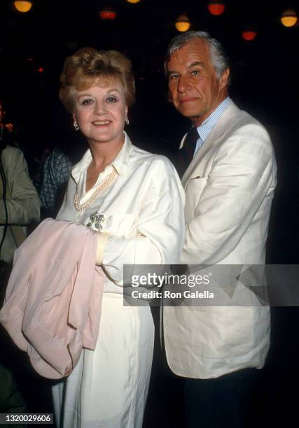 Angela Lansbury and Peter Shaw attend "The Untouchables" Premiere at Loew's Astor Plaza Theater in New York City on June 2, 1987.