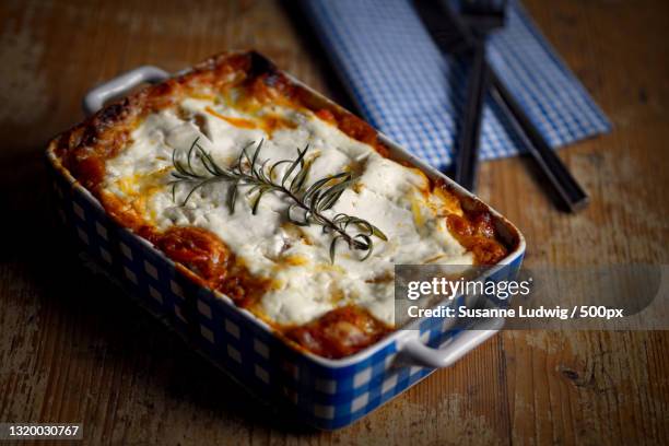 close-up of pizza in container on table,germany - lasagne stock pictures, royalty-free photos & images