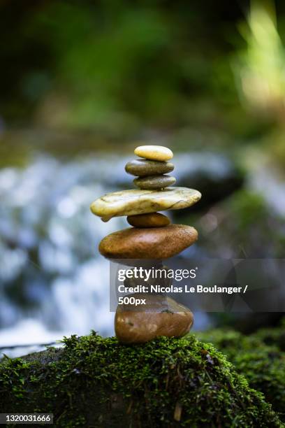 close-up of stacked stones - zen stone stock pictures, royalty-free photos & images