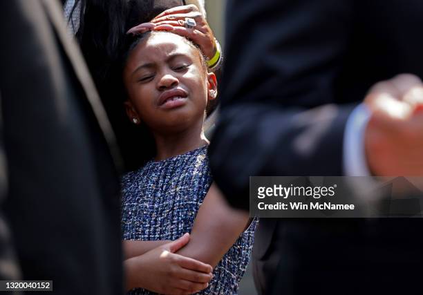 Gianna Floyd, daughter of George Floyd, stands with other members of the Floyd family as they answer questions outside the White House following a...