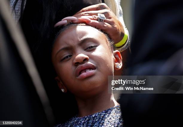 Gianna Floyd, daughter of George Floyd, stands with other members of the Floyd family as they answer questions outside the White House following a...