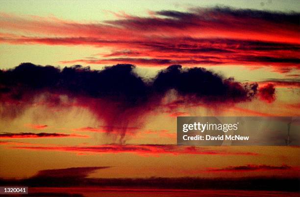 Clouds seem to glow like coals as the sun sets on the Carrizo Plain National Monument, June 1, 2001. President Bill Clinton established the national...