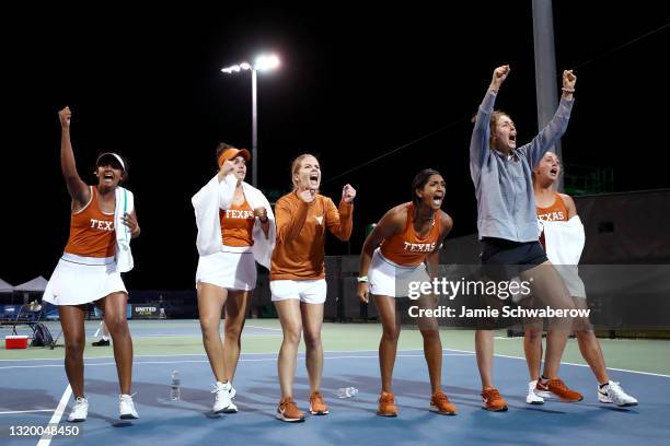 The Texas Longhorns cheer on Lulu Sun in her clinching match against Taisiya Pachkaleva of the Pepperdine Waves during the Division I Women"u2019s...